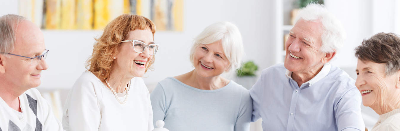 Clermont Park Senior Living Community in Denver, CO - group seniors having coffee