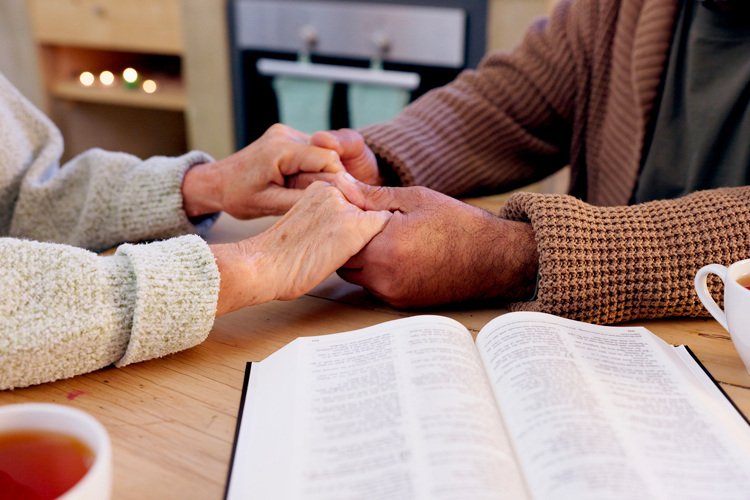 Clermont Park Senior Living Community in Denver, CO - couple holding hands