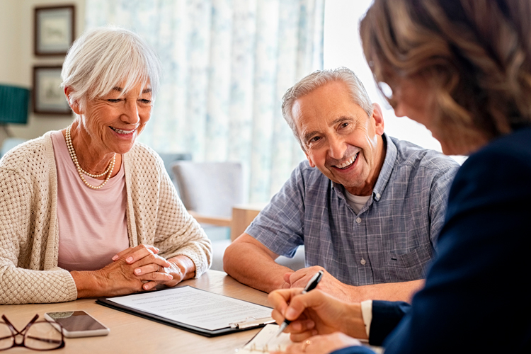 clermont park senior couple meeting with advisor Clermont Park Senior Living Community in Denver, CO - clermont park senior couple meeting with advisor