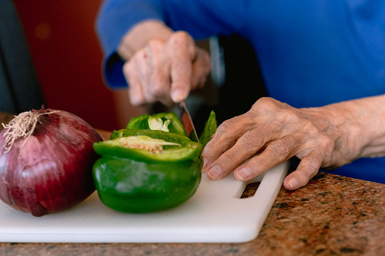 Clermont Park Senior Living Community in Denver, CO - cooking with care closeup