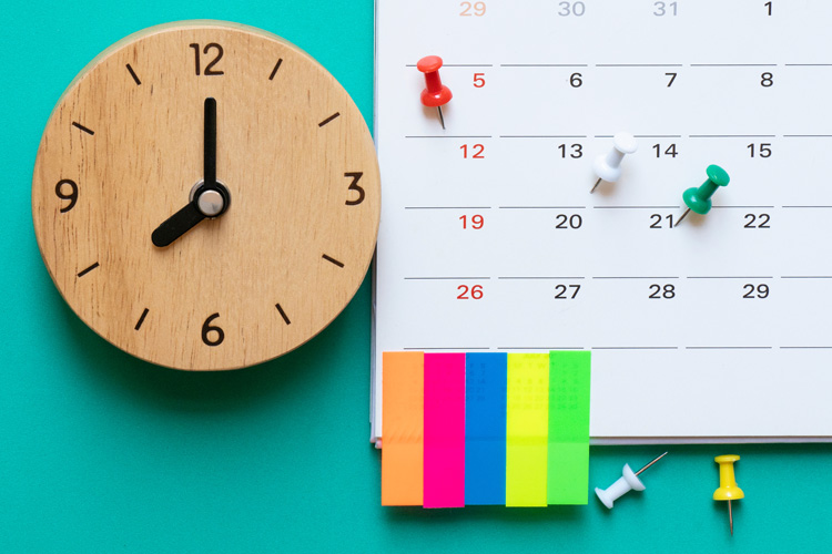 Clermont Park Senior Living Community in Denver, CO - clermont park clock with calendar and sticky notes