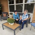 Clermont Park Senior Living Community in Denver, CO - gathering on the suites at clermont park s patio
