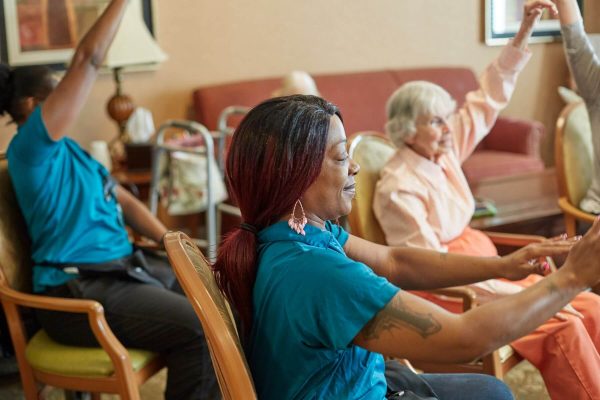 Clermont Park Senior Living Community in Denver, CO - team members participate in exercise class
